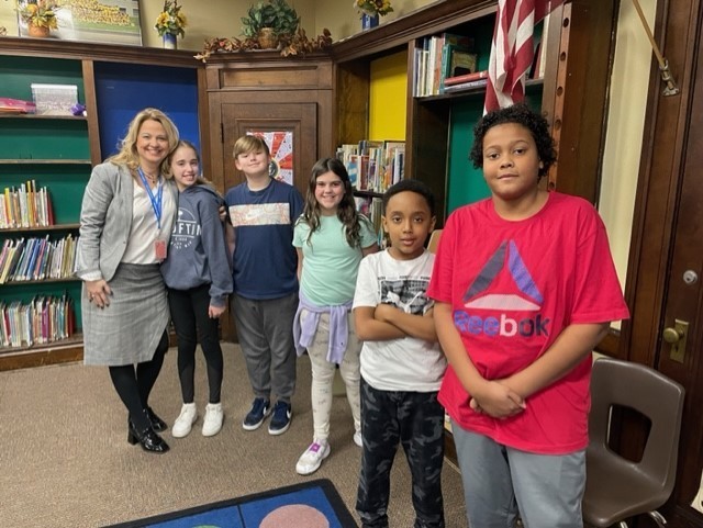 Dr. Miller is Shown with Madison Students