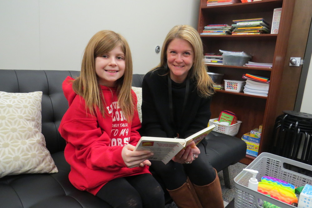 Elm Grove Elementary School Counselor Heather Hines is pictured with Dragon student Adalyn Bell.