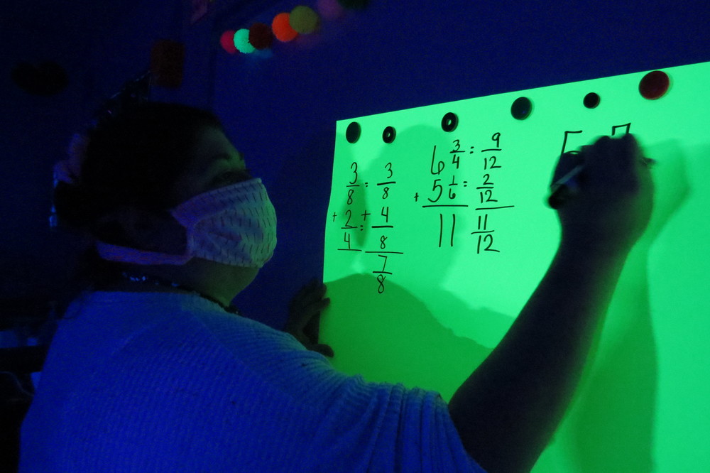 Teacher Brandy Lackie is shown during "Glow-in-the-Dark Math"