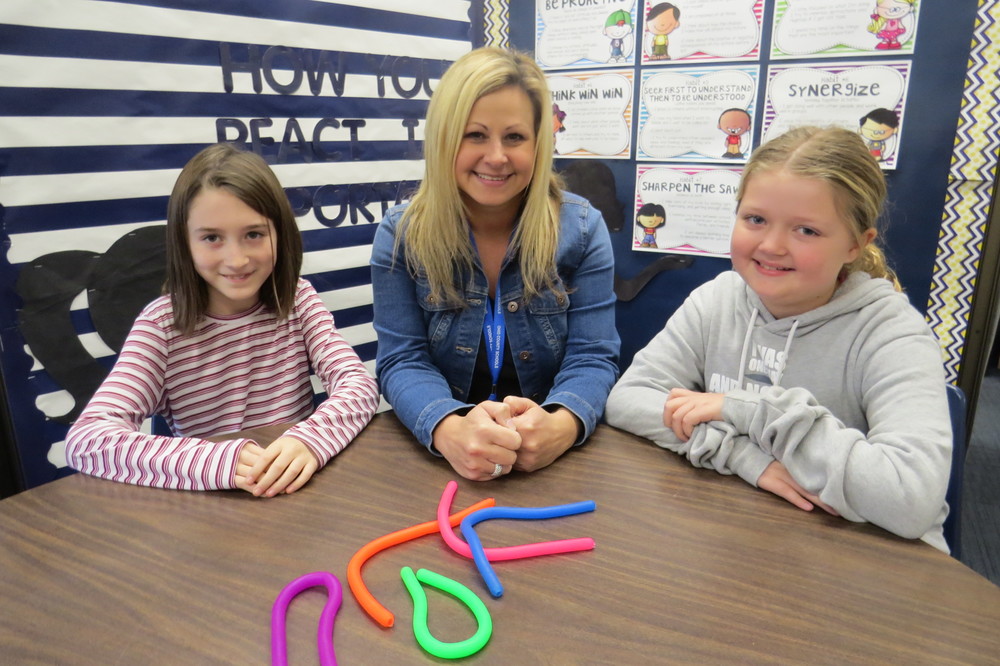 Photo: Bethlehem and West Liberty counselor Gretchen Gill is shown with Bethlehem Elementary School student Kate Cronin and Sophia Trabert