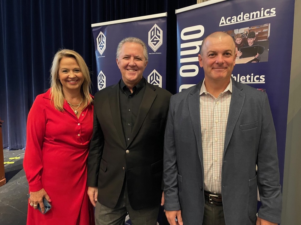 Pictured from left are Ohio County Schools Superintendent Kimberly Miller, author Dennis Snow and Assistant Superintendent Rick Jones.