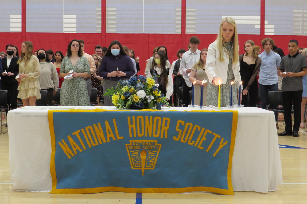 Wheeling Park High School's National Honor Society President Kayla Clatterbuck is shown during the candle-lighting ceremony