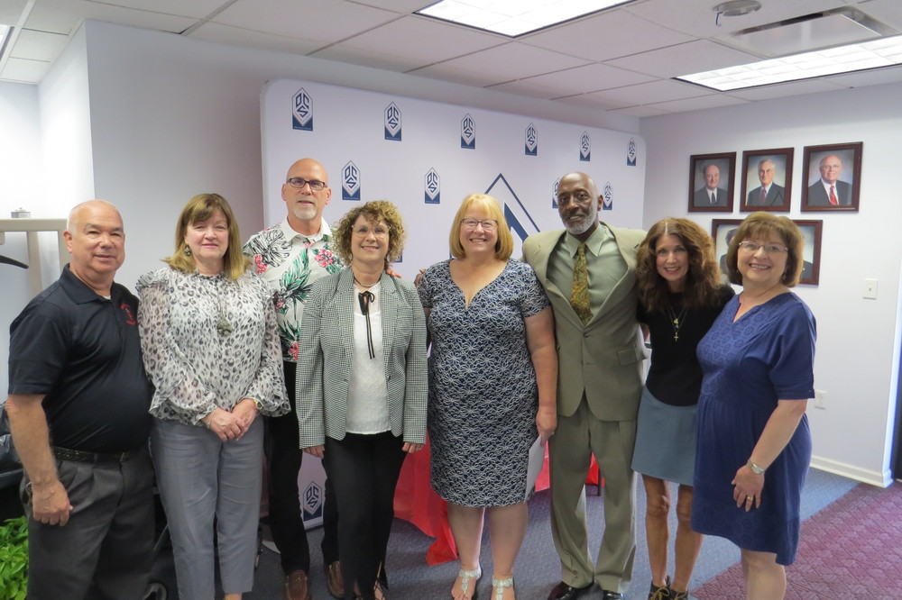 Pictured from left are 2022 Ohio County Schools retirees Rick Thomas, Ann Coleman, Dwaine Rodgers, Rhea Rodgers, Jane Haught, Randall Walker and Celeste Marshall